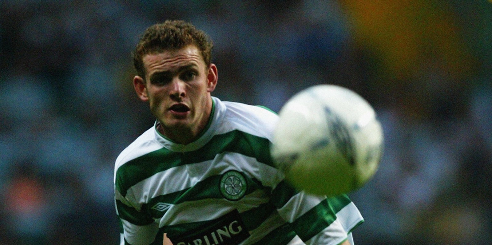Craig Beattie of Celtic chases the ball