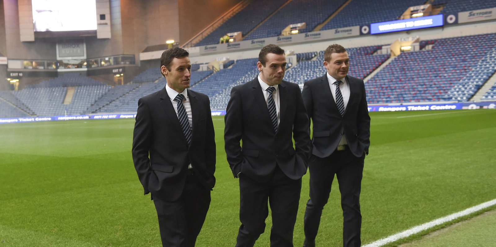 31/12/16 LADBROKES PREMIERSHIP.RANGERS v CELTIC.IBROX - GLASGOW.Match referee Steven McLean (left) inspects the pitch before the match