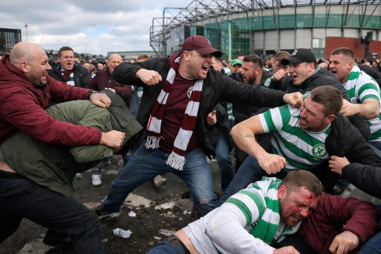 Hearts fans brawling with Celtic fans outside Celtic Park