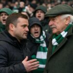 Shaun Maloney talking with Dermot Desmond as angry green Birgade Celtic supporters are in the background