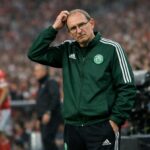 Martin O'Neill on the sidelines at Benfica scratching his head in bewilderment in adidas training gear