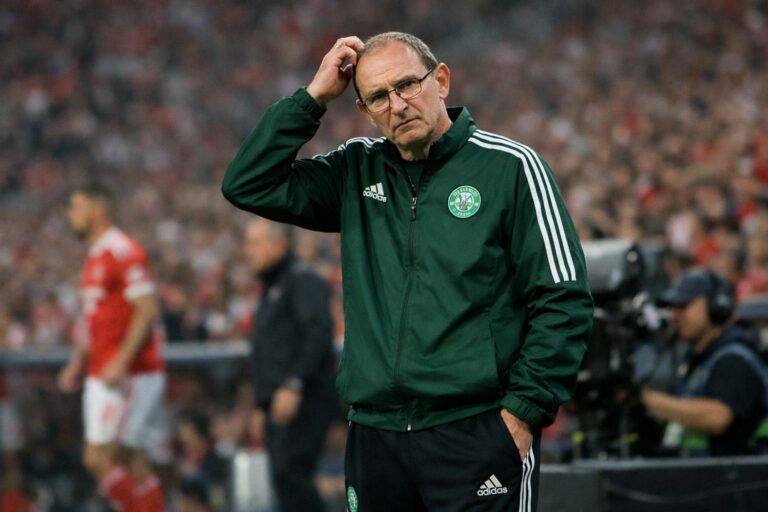 Martin O'Neill on the sidelines at Benfica scratching his head in bewilderment in adidas training gear
