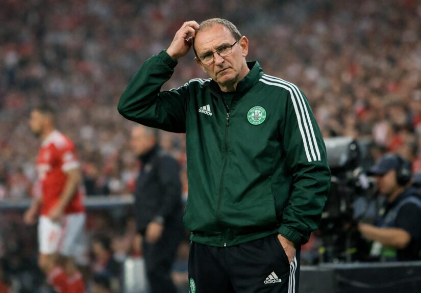 Martin O'Neill on the sidelines at Benfica scratching his head in bewilderment in adidas training gear
