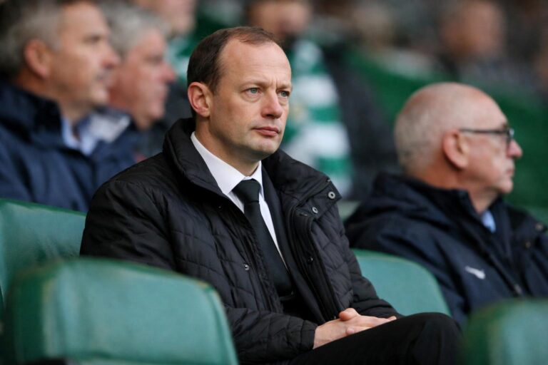 Head of Scottish referees Willie Collum sitting in the stands at game
