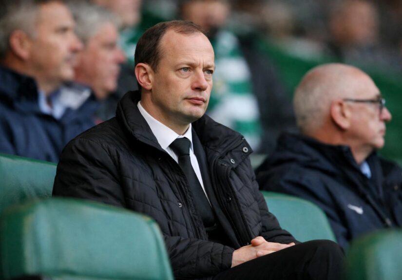 Head of Scottish referees Willie Collum sitting in the stands at game