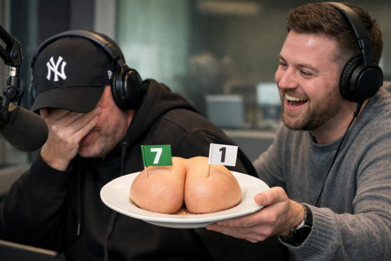 Ewen Cameron in his New York yankees baseball cap getting his bum handed to him on a plate with a 7 flag on one cheek and a 1